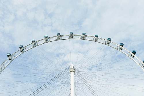 amusement park Ferris wheel during daytime leisure activities